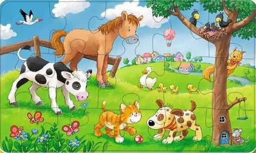 Children's ravensburger puzzle with cartoon animals in a farm setting
