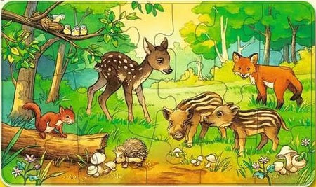 Children's ravensburger puzzle with forest animals including a deer, fox, and pigs on a green background.