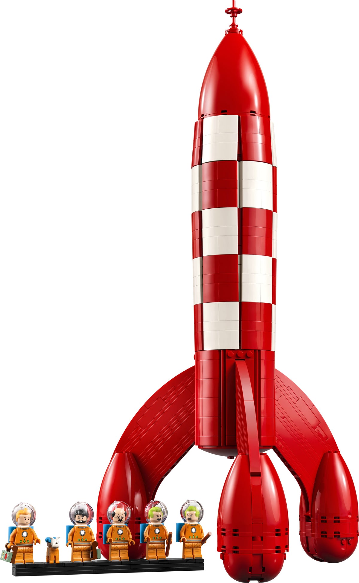 Red rocket model with four astronaut figures on a white background