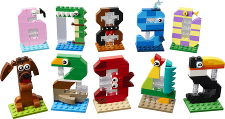 lego Set of colorful building block animals and numbers on a white background