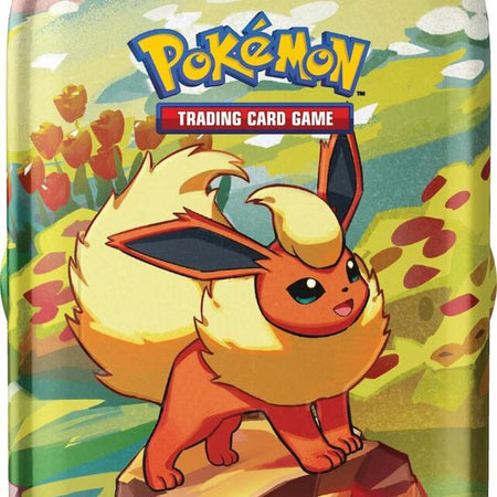 Pokémon trading card game tin featuring a character on a rock with a colorful background