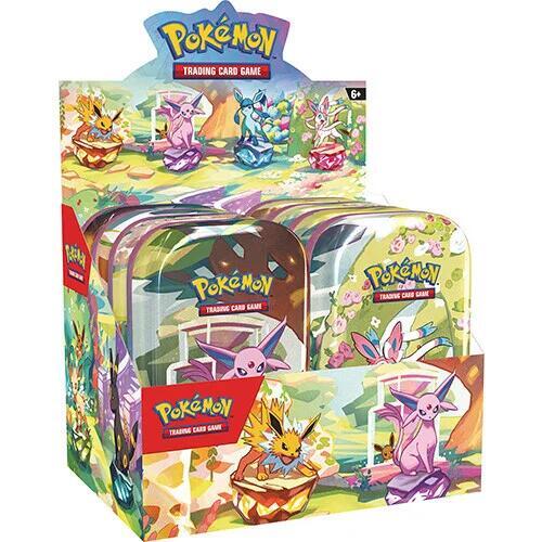 Pokémon trading card game packaging with colorful designs and character illustrations.