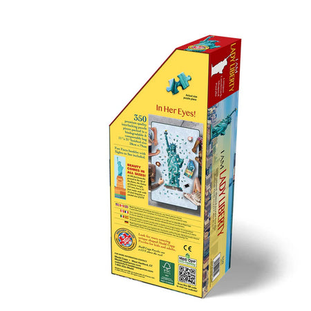 madd capp Jigsaw puzzle box with colorful design featuring the Statue of Liberty on a white background