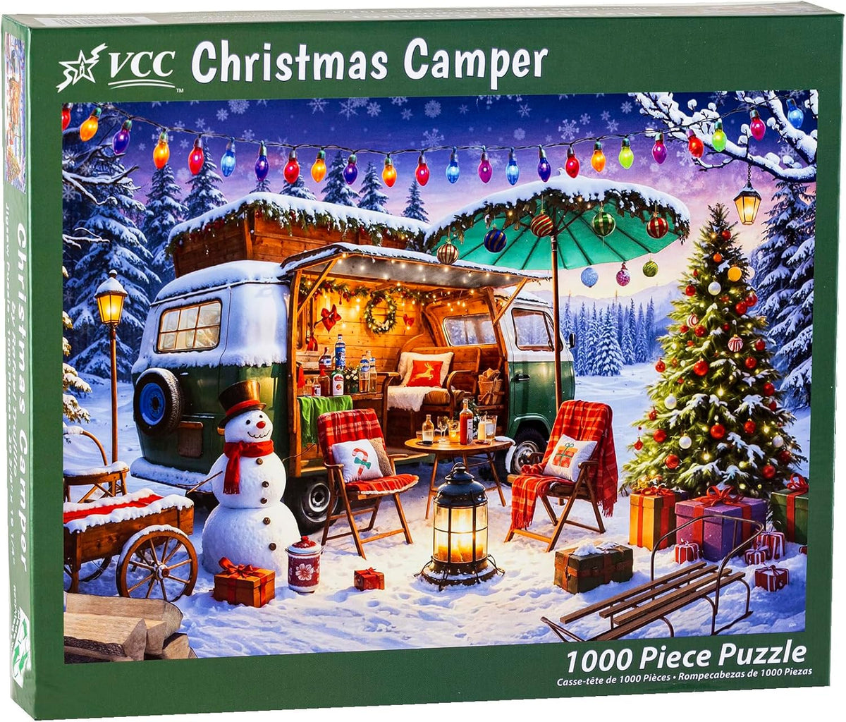 VCC Christmas Camper 1000-piece jigsaw puzzle box with a festive winter scene featuring a camper, Christmas tree, and snowman.