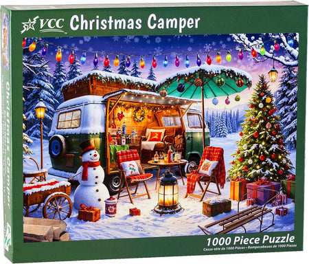 VCC Christmas Camper 1000-piece jigsaw puzzle box with a festive winter scene featuring a camper, Christmas tree, and snowman.