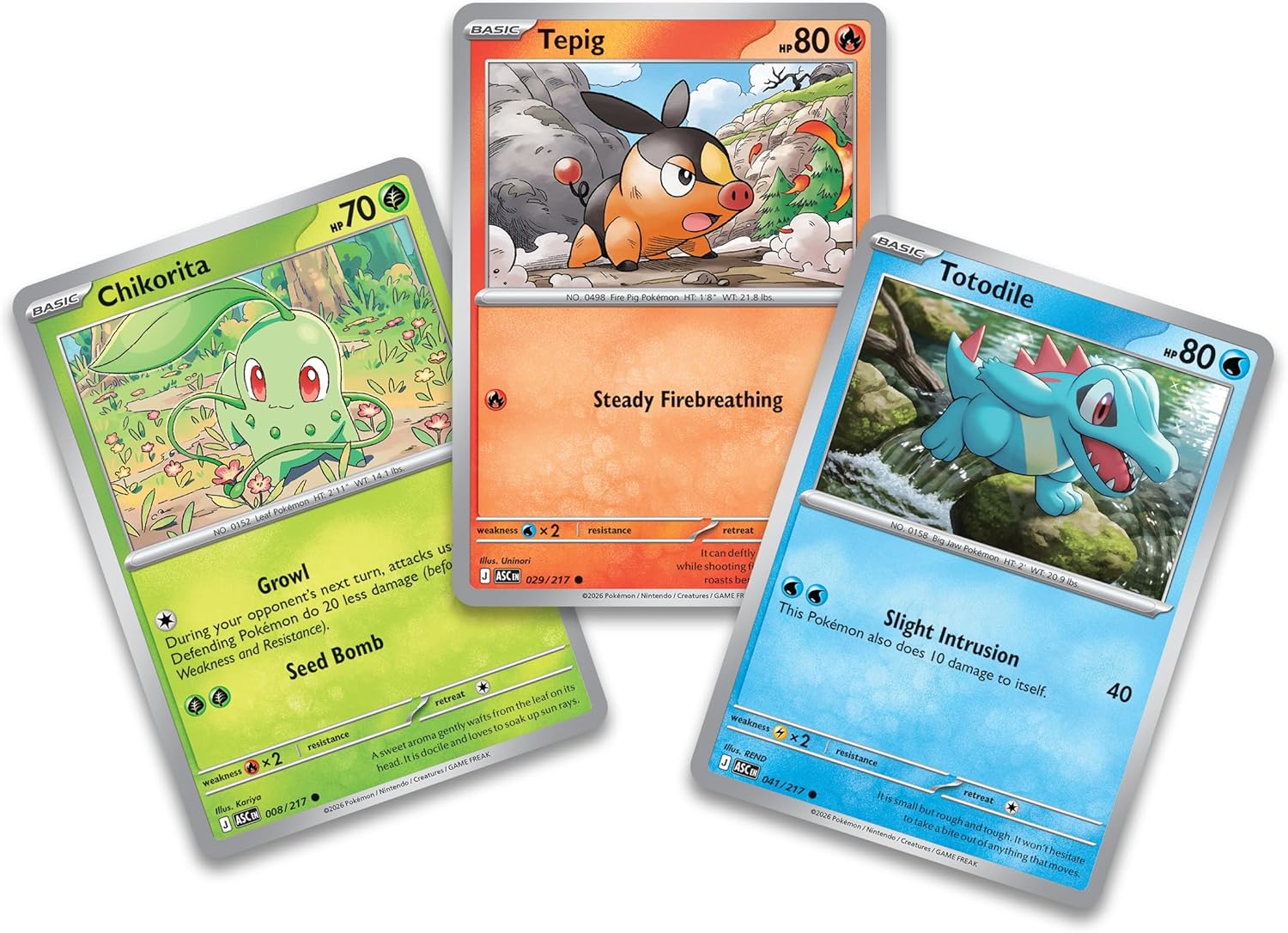 Three Pokémon trading cards displayed on a white background