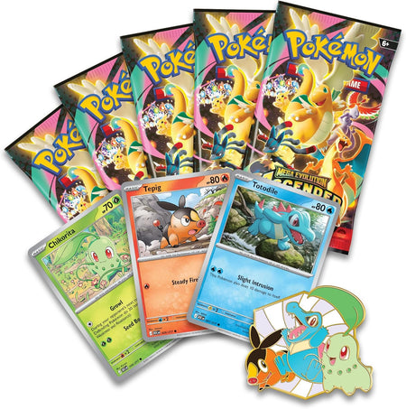 Collection of Pokémon trading cards and packaging on a white background