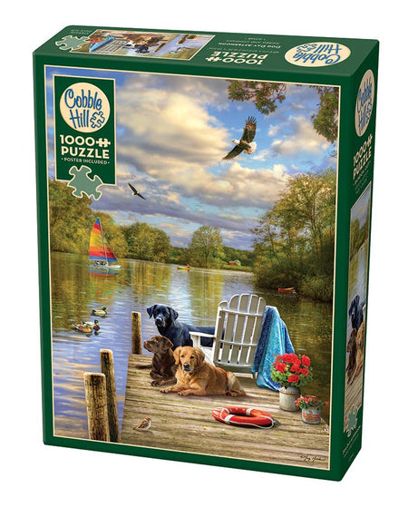 Cobble Hill jigsaw puzzle box with a scenic lake and dogs on a dock