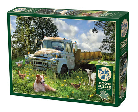 Cobble Hill 1000-piece jigsaw puzzle box featuring a truck and animals in a field