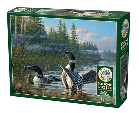 Cobble Hill 1000-piece jigsaw puzzle box with loons on a lake scene
