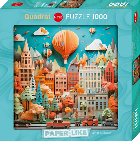 Heye 1000-piece Jigsaw puzzle depicting a town with a paper-like artistic style, including blue box packaging.