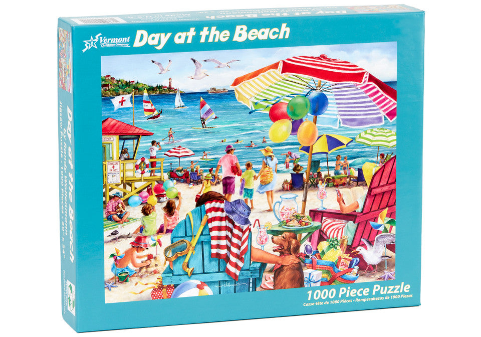 Vermont christmas company 1000-piece jigsaw Puzzle box with a day at the beach scene illustration.