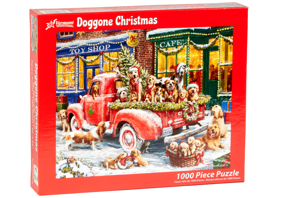 Vermont christmas company 1000-piece Jigsaw puzzle box featuring a red truck with dogs and a festive town scene, labeled 'Doggone Christmas'.