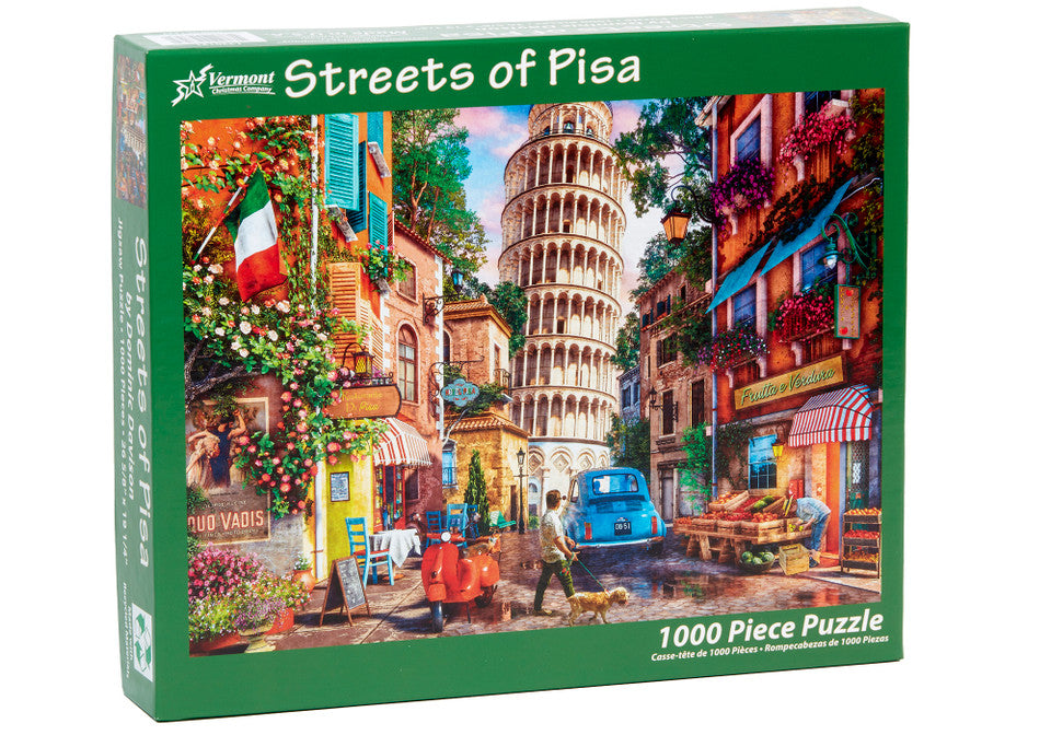 vermont christmas company 1000-piece Jigsaw puzzle box titled 'Streets of Pisa' with colorful street scene and Leaning Tower of Pisa on the cover.