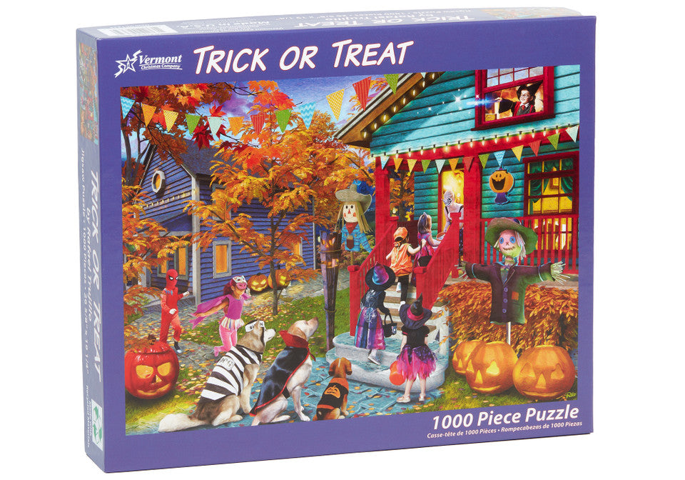 Vermont Christmas company trick or treat 1000-piece jigsaw puzzle box with Halloween-themed scene featuring people and pets.