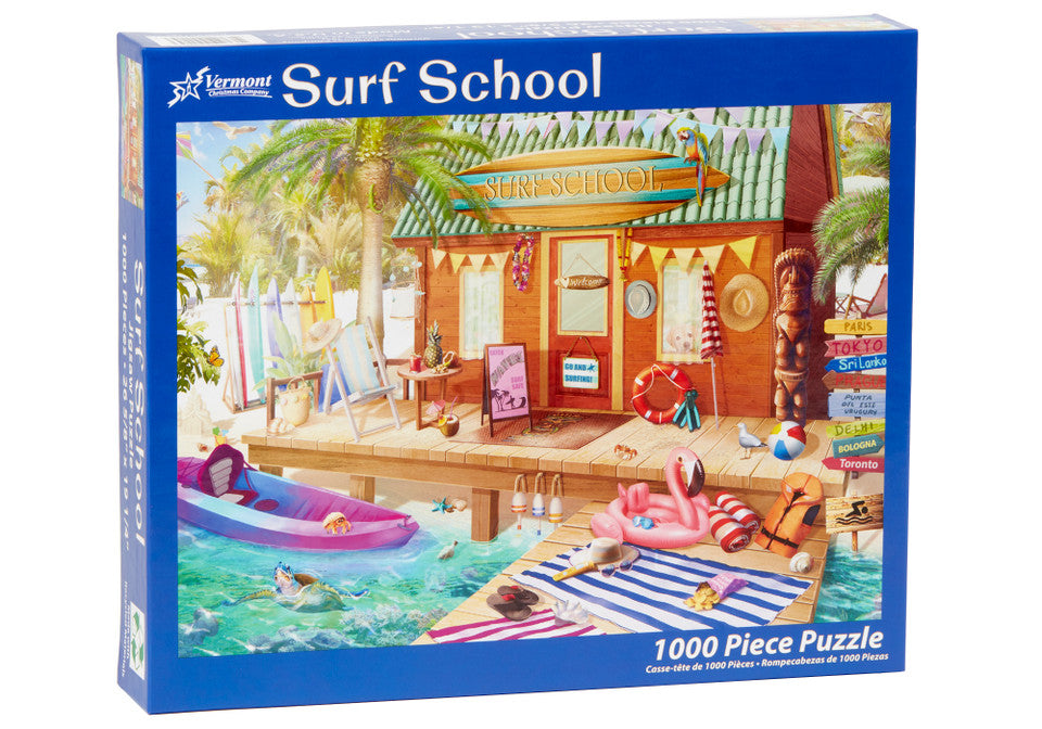 vermont christmas company 1000-piece Puzzle box titled 'Surf School' with a beach-themed scene on the cover.