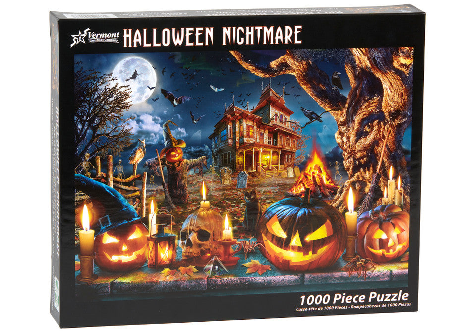 vermont christmas company Halloween-themed 1000-piece puzzle box with pumpkins, candles, and a haunted house on the cover.
