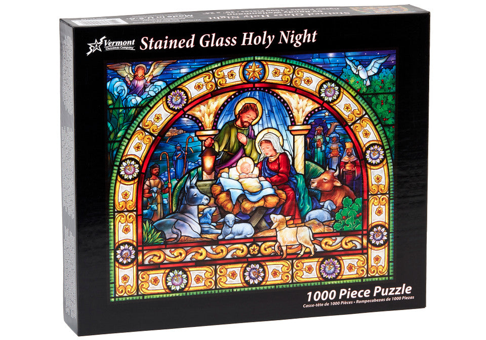 Vermont Christmas Company Stained Glass Holy Night jigsaw puzzle box with colorful nativity scene illustration.