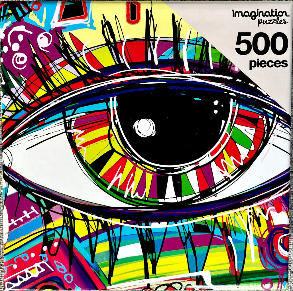 Colorful box image of a 500 piece jigsaw puzzle of an eye
