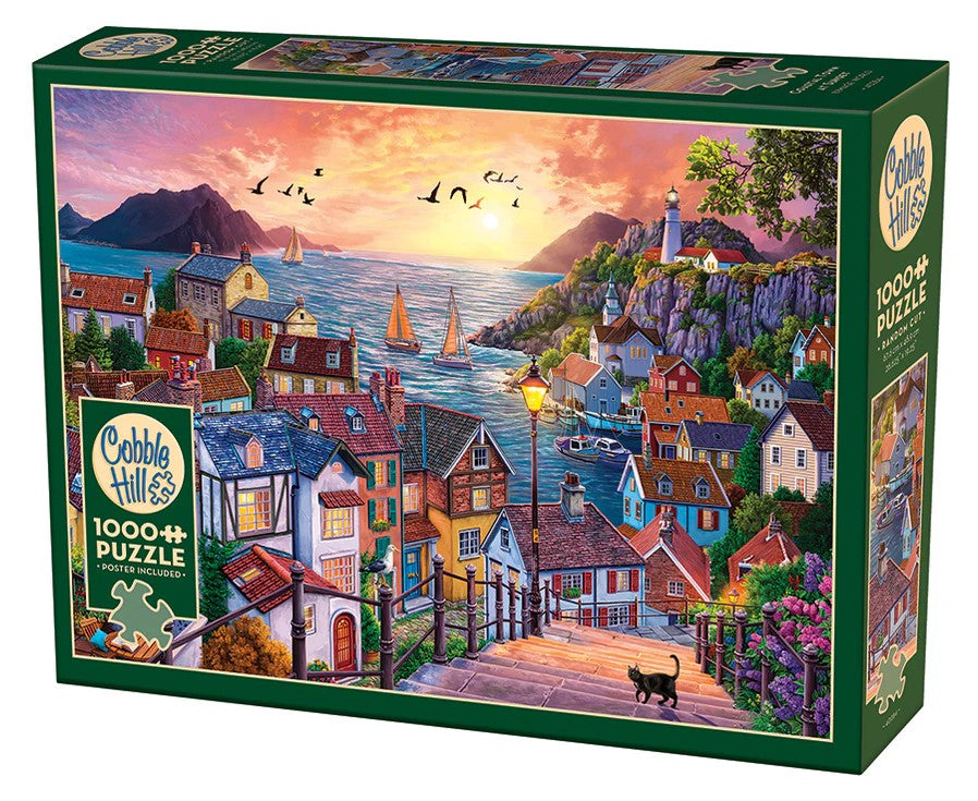 Cobble Hill 1000-piece jigsaw puzzle box with a coastal village scene at sunset