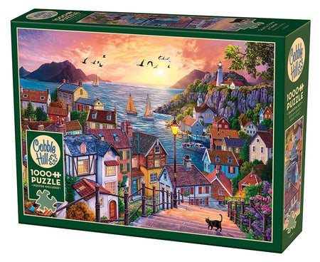 Cobble Hill 1000-piece jigsaw puzzle box with a coastal village scene at sunset