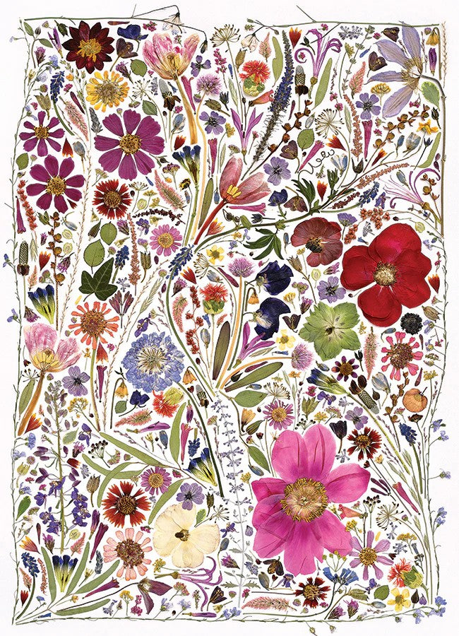 Cobble hill 1000-piece jigsaw puzzle of colorful floral pattern with various flowers on a white background