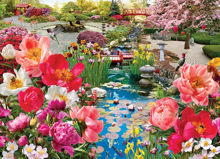 cobble hill 1000-piece jigsaw puzzle of Colorful Japanese garden scene with flowers, a pond, and a bridge.