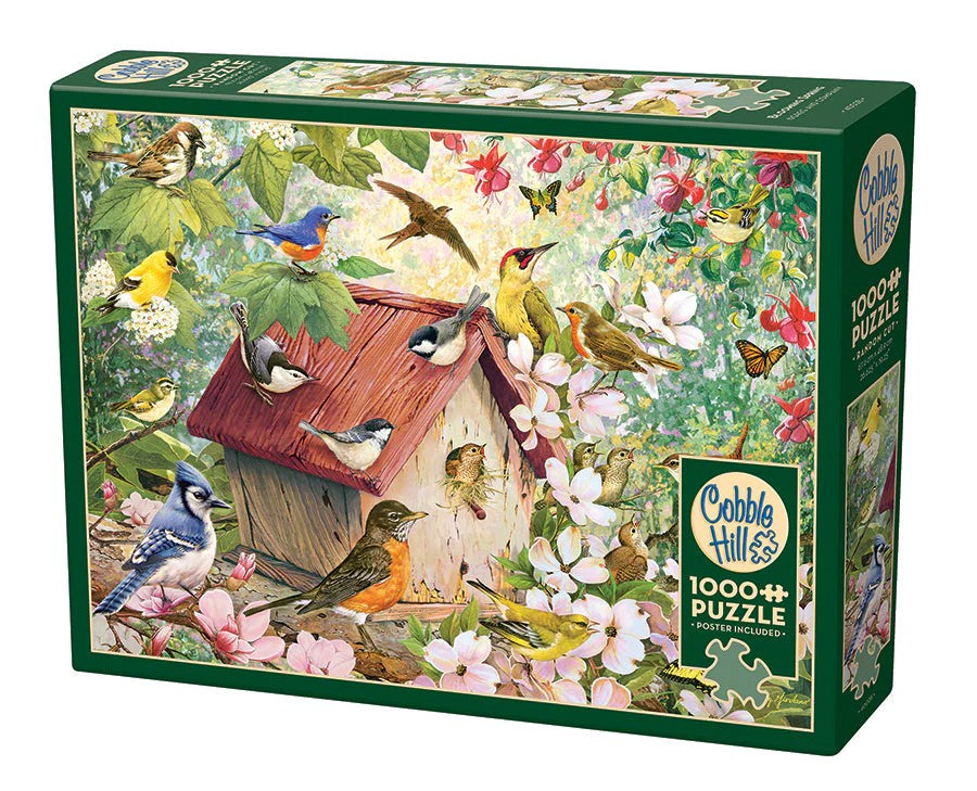 cobble hill 1000-piece Jigsaw puzzle box featuring birds and a birdhouse 