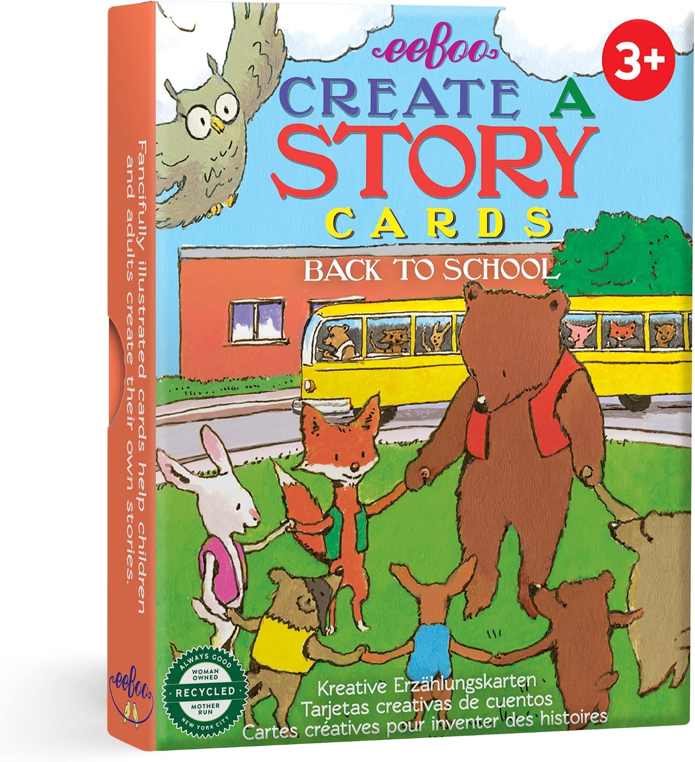 Front and spine view of a children's card deck box titled 'eeboo Create a Story Cards Back to School' with colorful cartoon animals, a yellow school bus, and a red '3+' age badge on a white background.