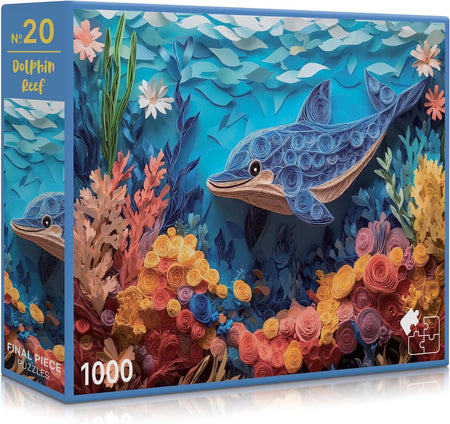 Jigsaw puzzle box with a dolphin and coral design on a blue background