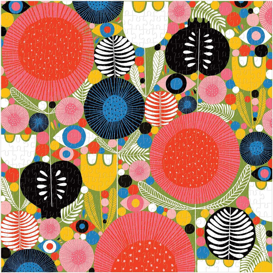 galison eyes in the garden colorful jigsaw puzzle featuring pattern of geometric shapes and floral elements on a multicolor background