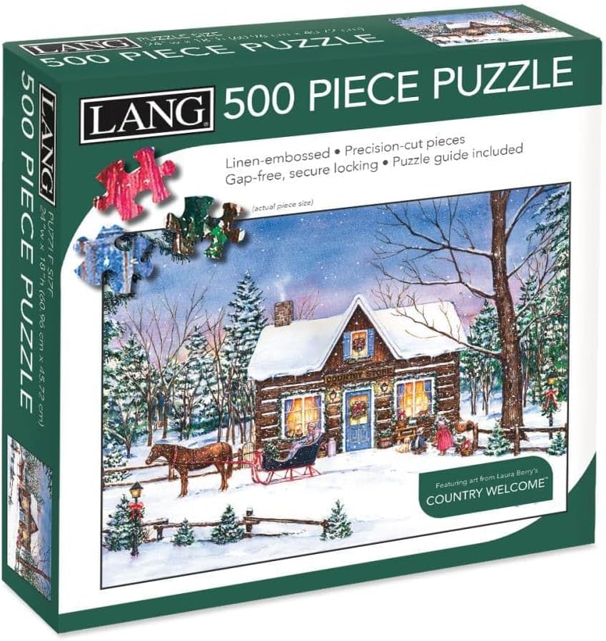 Lang 500-piece winter holiday puzzle box titled "magical evening" featuring a snowy log cabin scene with trees, sleighs, and people. The green box includes product text and small puzzle-piece graphics on the front.