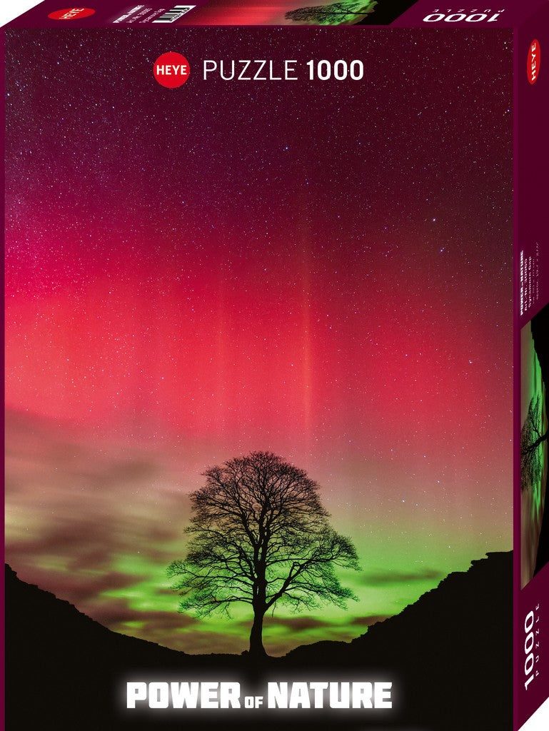 Puzzle box with a tree silhouette under a vibrant night sky with red and green colors.