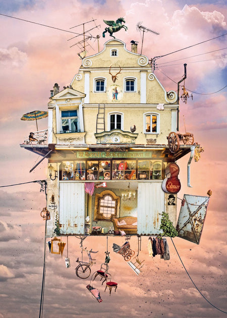 A heye 1000-piece jigsaw puzzle depicting a whimsical scene with a house made of various colorful objects and items, such as bicycles and umbrellas, against a cloudy sky.