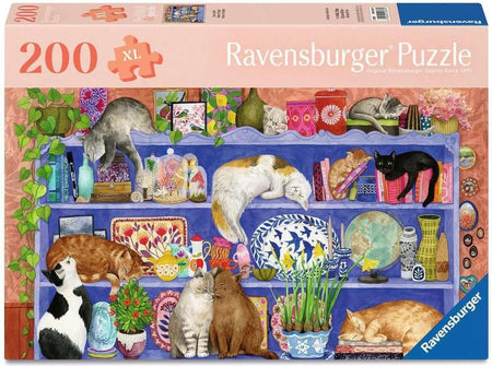 Ravensburger puzzle box with cats on a shelf design