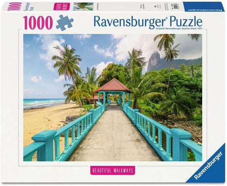 Ravensburger jigsaw puzzle box with a tropical scene featuring a blue walkway, beach, and mountains.