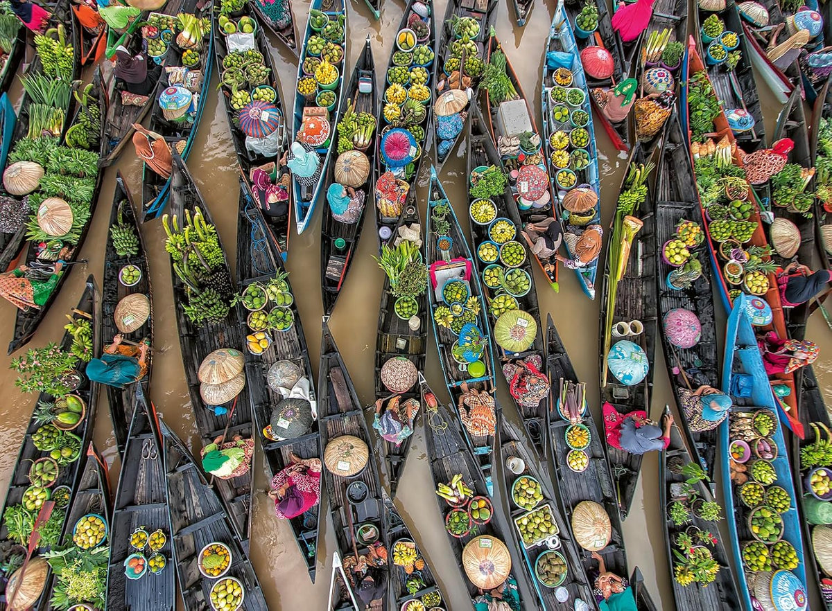 ravensburger floating market, indonesia jigsaw puzzle of Top-down view of boats filled with colorful goods at a floating market.
