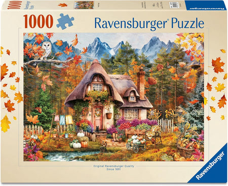 Ravensburger puzzle box with a scenic autumn-themed design featuring a cottage and nature.