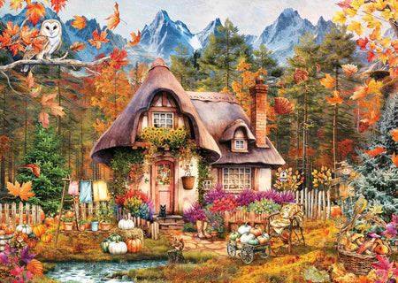 ravensburger pumpkin cottage jigsaw puzzle of autumn scene with a quaint house, colorful foliage, an owl and a black cat