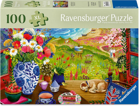 Ravensburger puzzle box with a colorful garden scene and flowers.