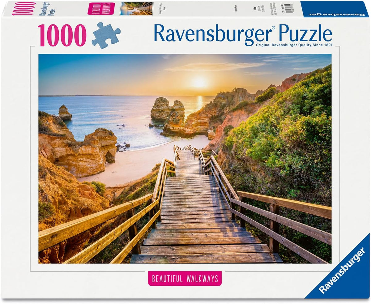 Ravensburger stairway to camilo beach, algarve jigsaw puzzle box with a scenic beach and staircase design.