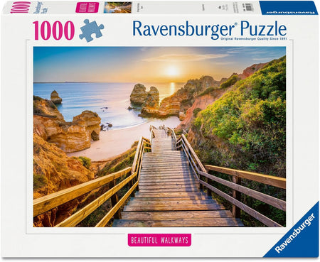 Ravensburger stairway to camilo beach, algarve jigsaw puzzle box with a scenic beach and staircase design.