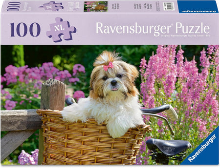 Ravensburger puzzle box with a dog in a basket and flowers in the background