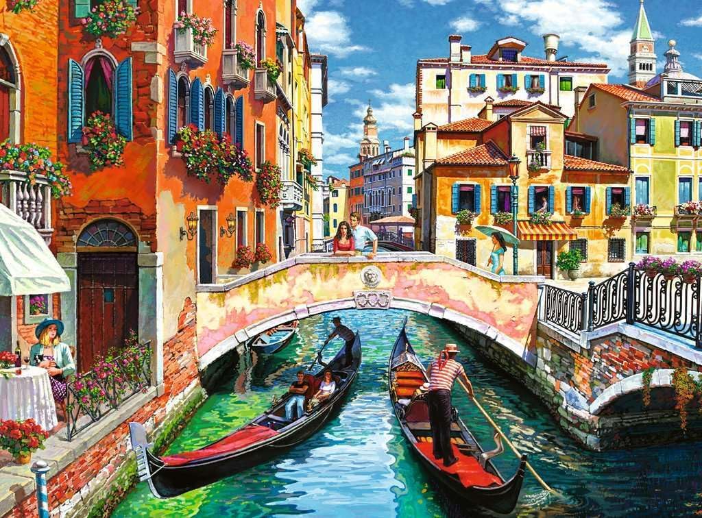 Colorful ravensburger venice jigsaw puzzle of Italian canal scene with gondolas and buildings.
